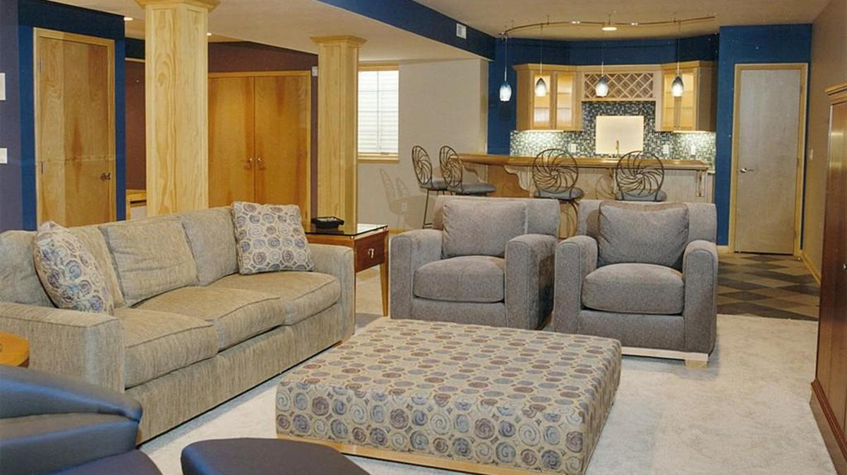 The right use of light, furniture, flooring and color can transform your basement.