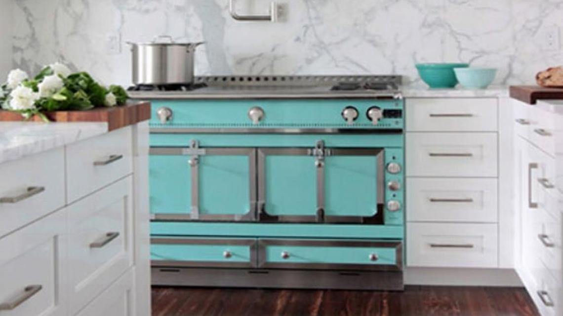 “I think a beautiful slab of honed Calacatta marble is the perfect way to make a statement in a kitchen,” says Raleigh designer Robert MacNeill.