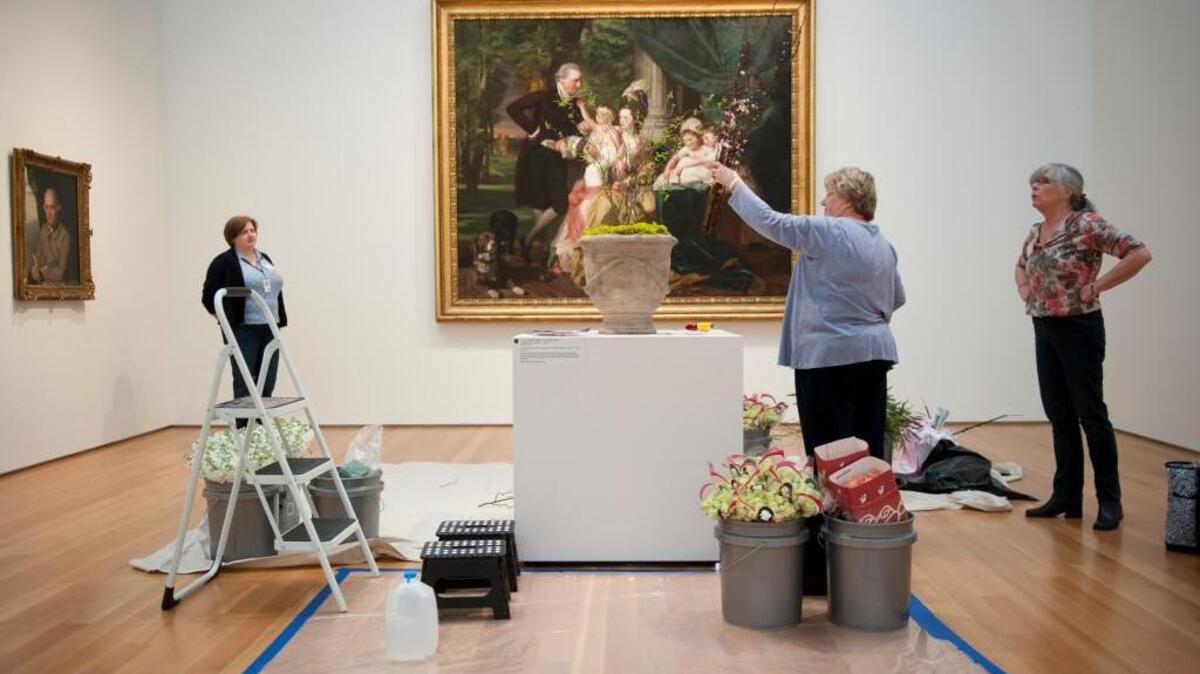 Floral artists set up their art-inspired bouquets as part of the 2015 Art in Bloom event at the N.C. Museum of Art in Raleigh.