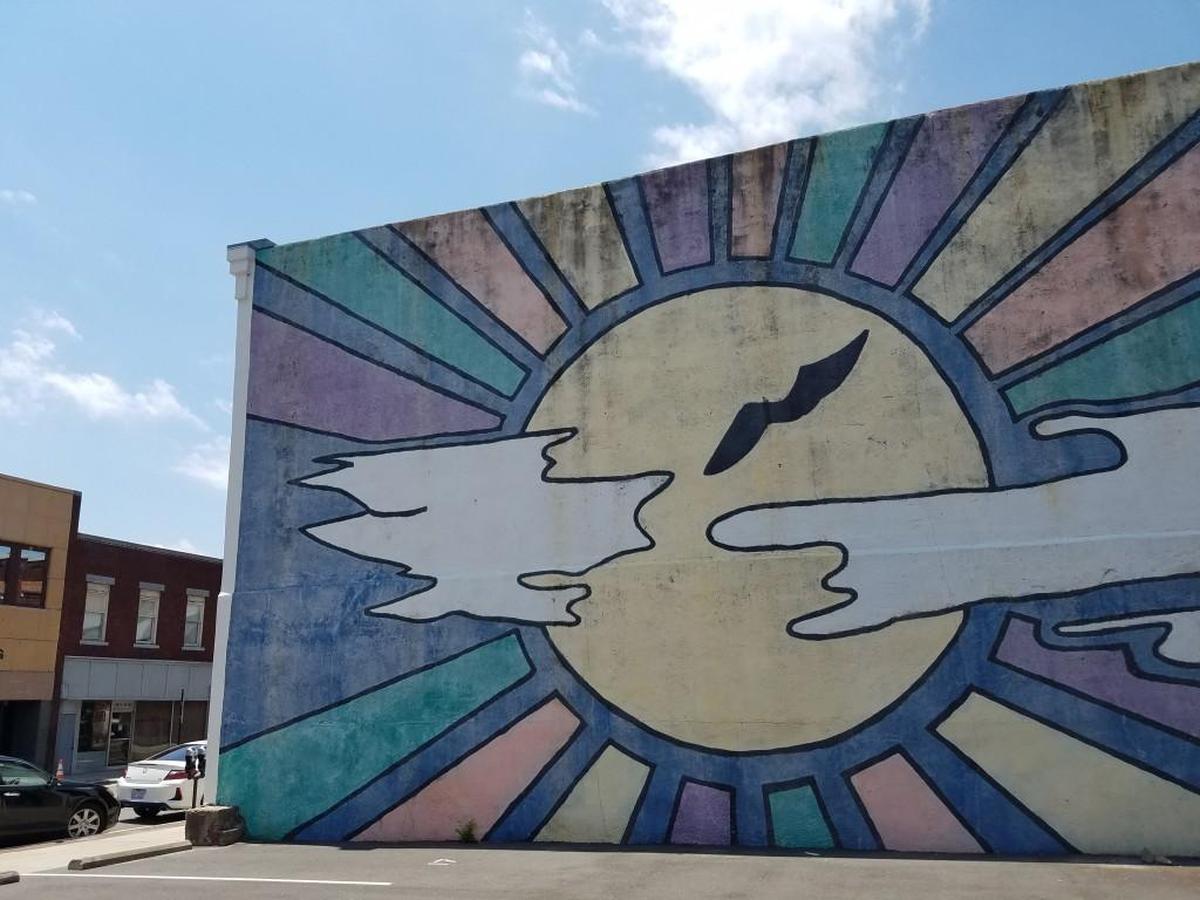 Here Comes the Sun mural at 119 E. Main St., Durham