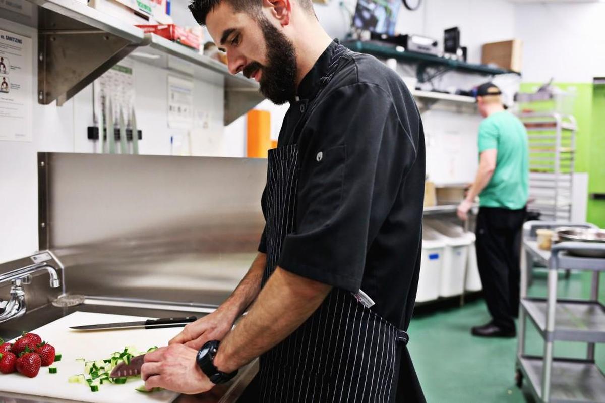 Adam Dillard of Berry Brothers makes his orzo pasta salad with the company's Strawberry Rosemary Vinaigrette May 11, 2018, in Raleigh. Dillard will be at the Got to Be NC event May 18-20th at the North Carolina State Fairgrounds.