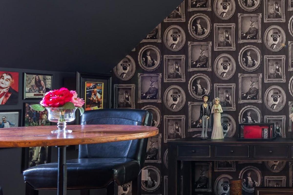Funky Wallpaper: Choose a fun and unexpected wallpaper as a focal point to bring in an exciting vibe, such as Victorian pet portraits.
