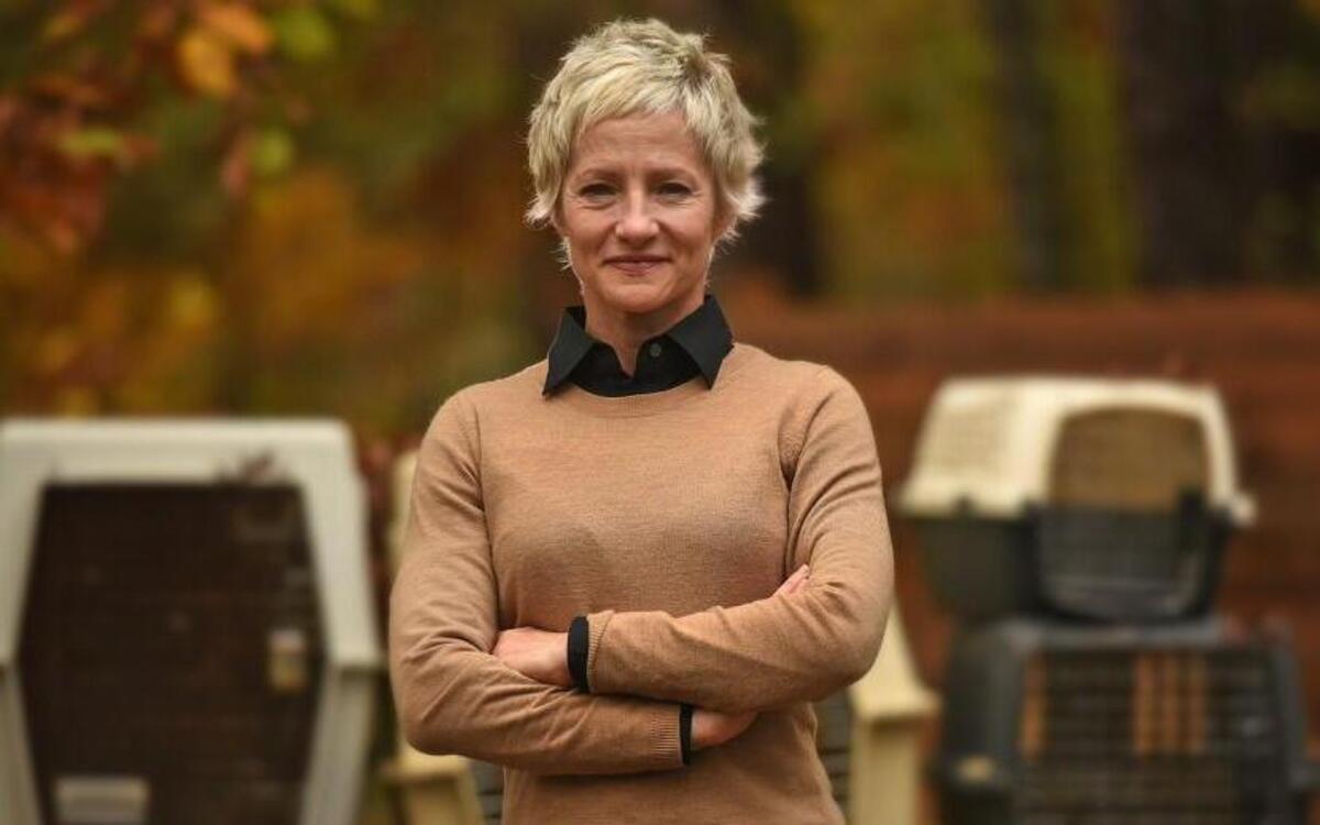 Lori Hensley, the director of the Coalition to Unchain Dogs pictured in the backyard of her home in Durham, N.C. Wednesday, Nov. 10, 2015. The ASPCA has named Hensley as their Henry Bergh Award honoree.