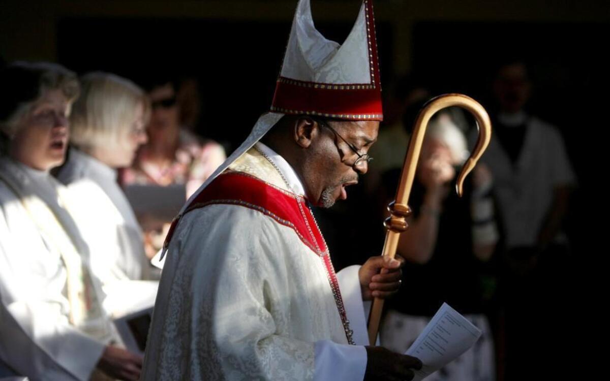 Bishop Michael Curry of the Episcopal Diocese of North Carolina leads the procession during a service commemorating the life of Anna Pauline Murray at St. Titus Episcopal Church in Durham July 1, 2009.