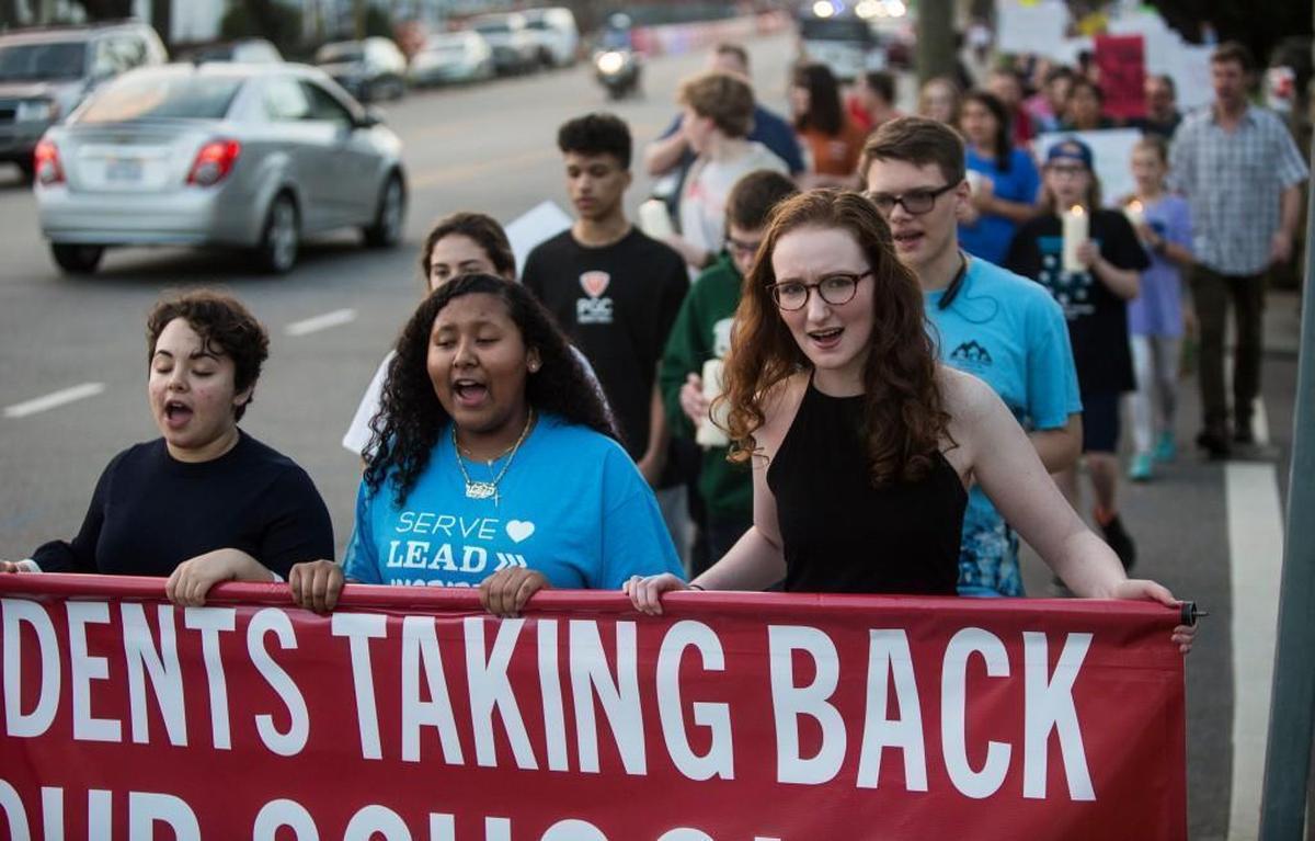 Hundreds of mostly students march from Pullen Memorial Baptist Church in Raleigh to the North Carolina State Capitol on Feb. 20 in response to a mass shooting that killed 17 people at Marjory Stoneman Douglas High School in Parkland, Fla.