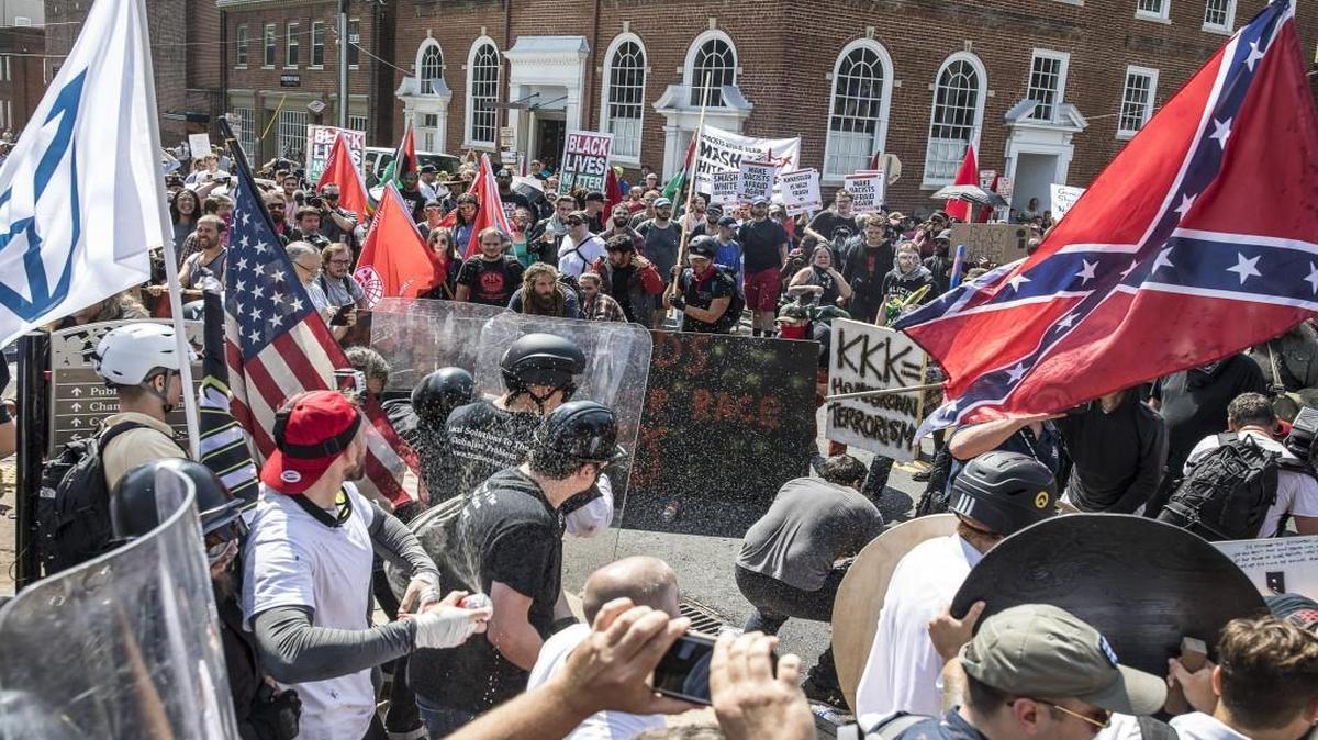 White nationalists riot with counter protesters in Charlottesville, Va., Aug. 12, 2017.