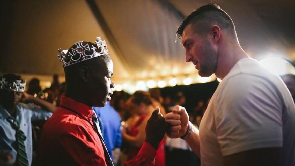 Tim Tebow, right, and his foundation hosts a Night to Shine, a prom night experience for people with special needs ages 14 and older.