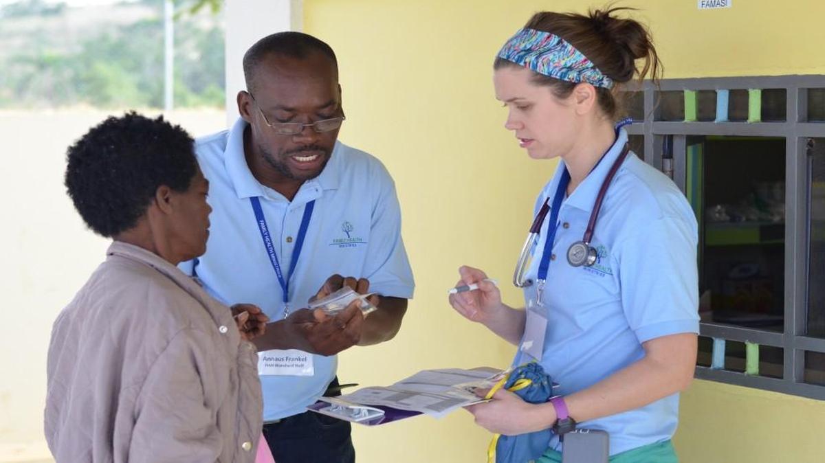 Dr. Kathryn Cziraky, right, and pharmacist David Shaw, both members of 519 Church in the Triangle, do mission work at Carmelle Voltaire Women’s Health Center in Haiti.