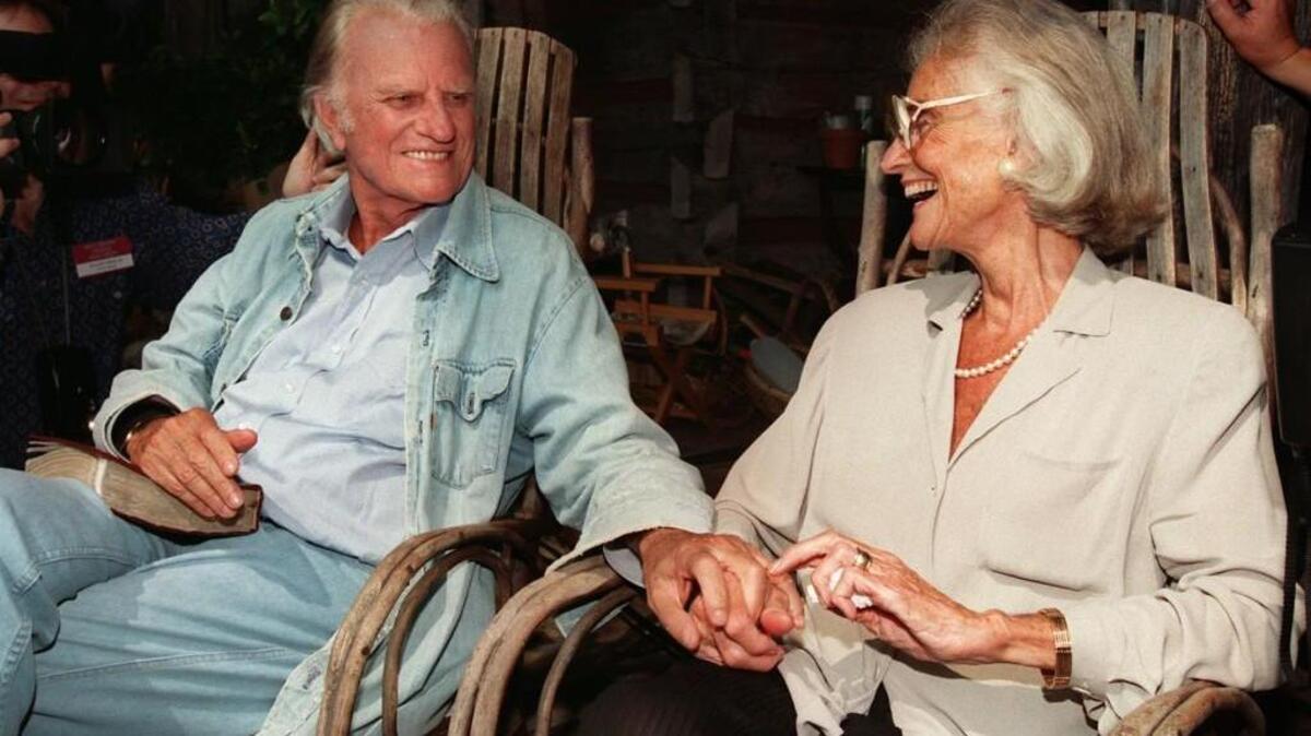 The Rev. Billy Graham and his wife Ruth during a press conference at their home in Montreat in 1996.