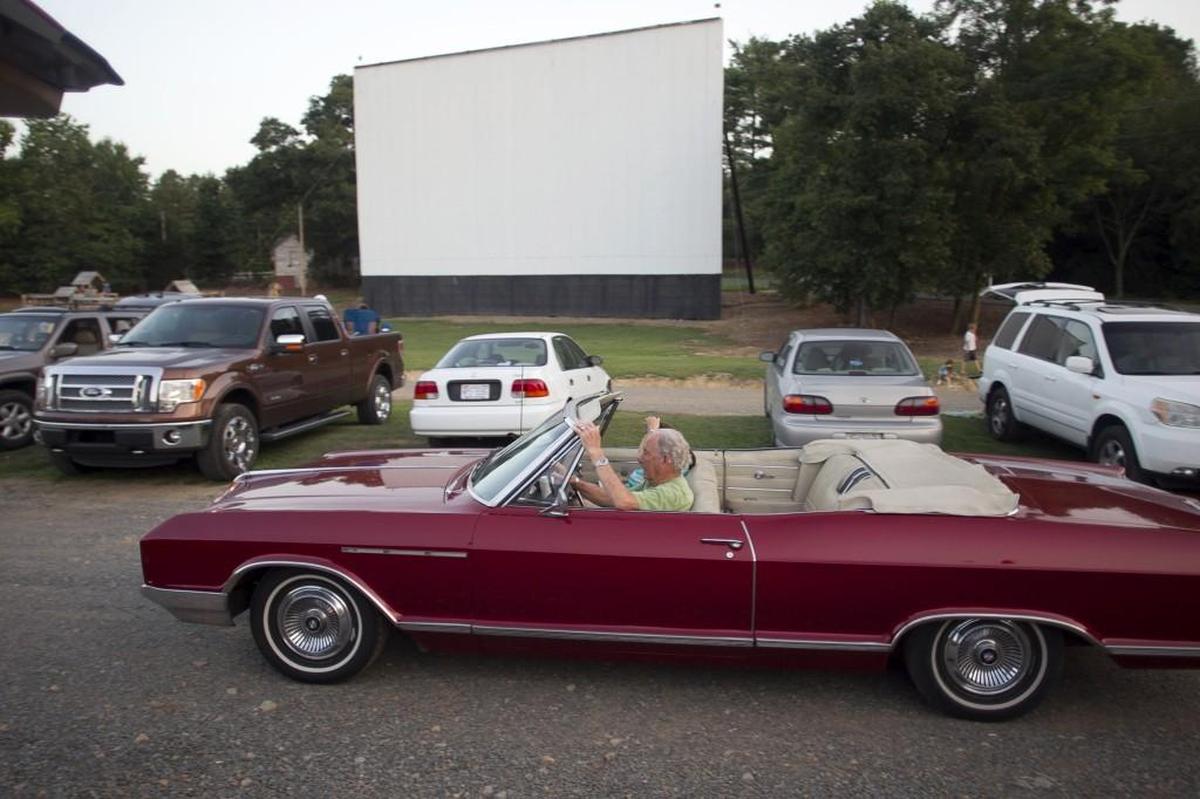 James McDaniel of Salisbury, and his wife Barbara McDaniel look for a parking spot at the Badin Road Drive-In in Albemarle.