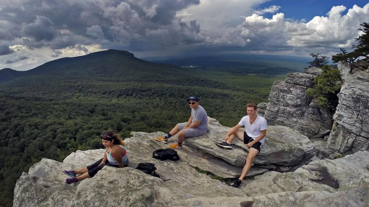 Riccy Marroquin, Luis Laverde and Ryan Long enjoyed a picture perfect day atop Hanging Rock last summer . Hanging Rock State Park, near Danbury, is one of North Carolina’s crown jewels.