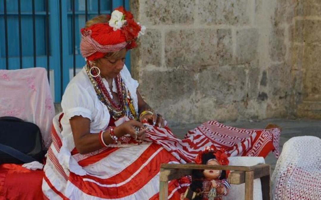 A seamstress and her souvenirs in Old Havana.