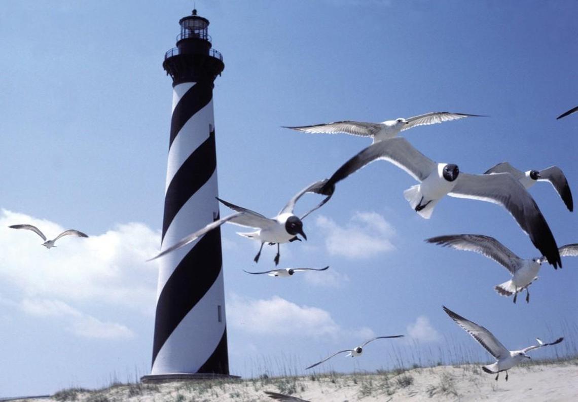 Cape Hatteras Lighthouse when it was still at the water's edge on North Carolina's Outer Banks.