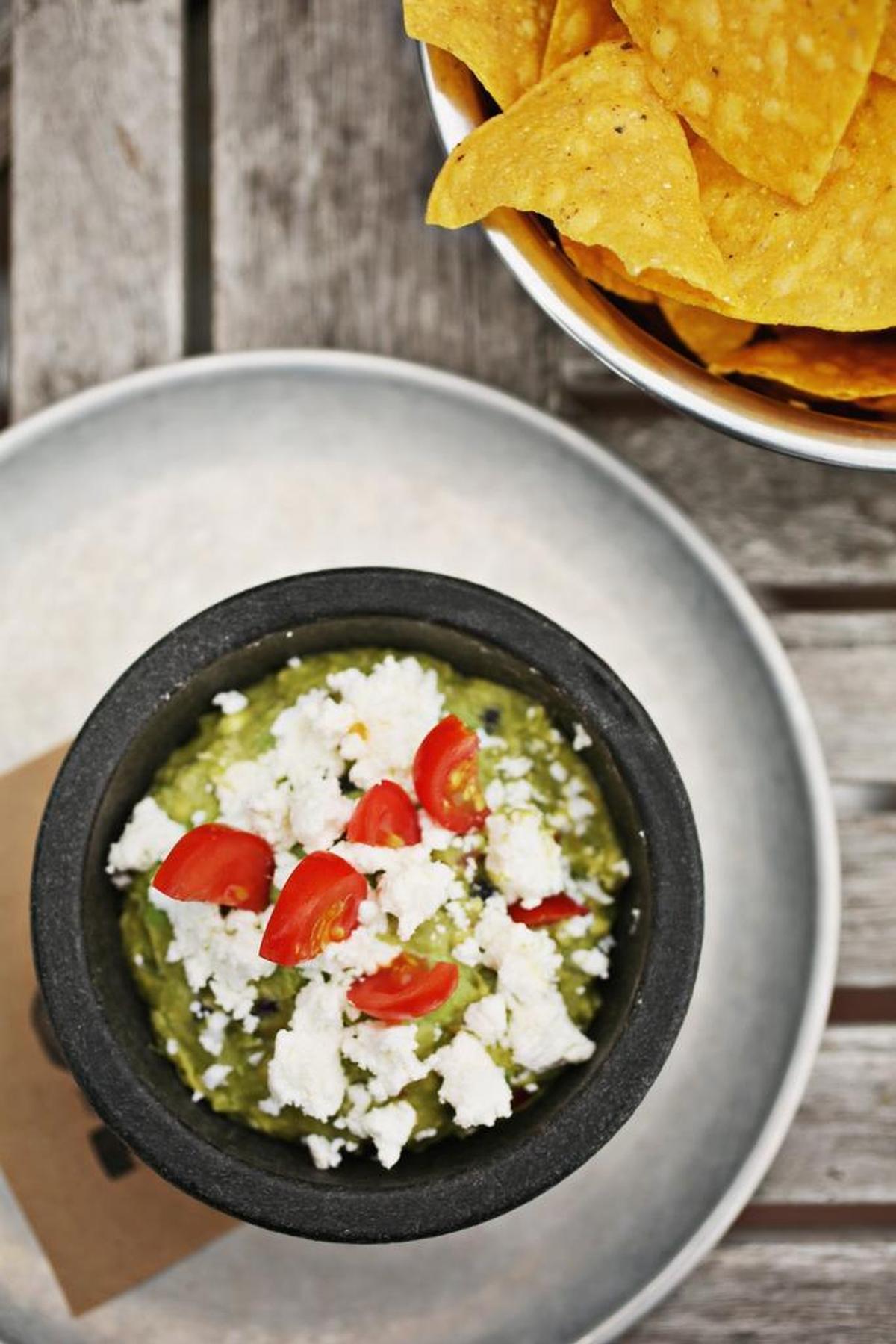 "The tanginess of the goat cheese from Holly Grove Farms is the perfect contrast with the richness of the avocados," says Chef Jason Smith of the Goat Cheese Guacamole at Cantina 18 in Raleigh.