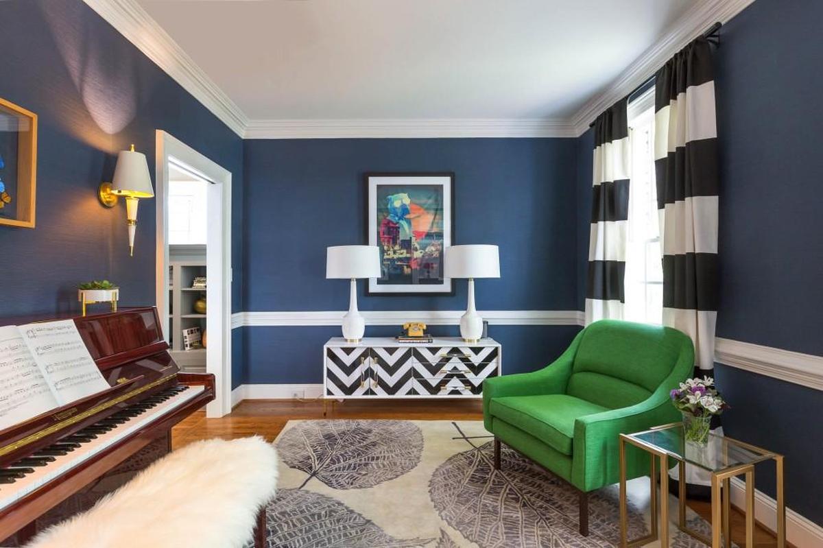 Mixing patterns: Layering and mixing patterns is a great way to add a playful eye teaser. Consider striped black and white curtains to complement the chevron pattern on the console for a visually alluring aesthetic.