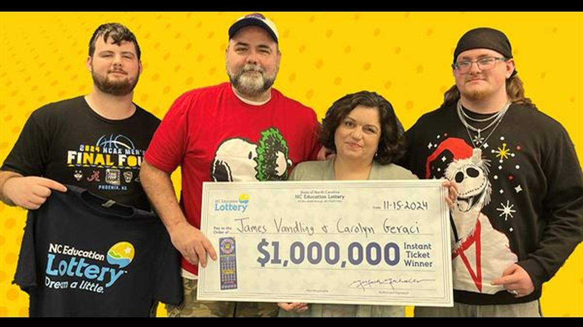 James Vandling, second from left, is pictured with his wife and two sons. The North Carolina man got much richer in a scratch-off game.