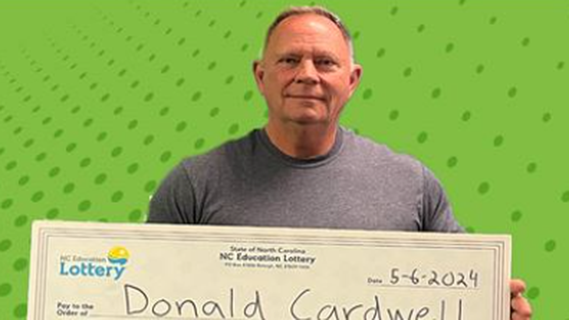 Donald Cardwell bought a winning lottery ticket while his wife’s flight was delayed.