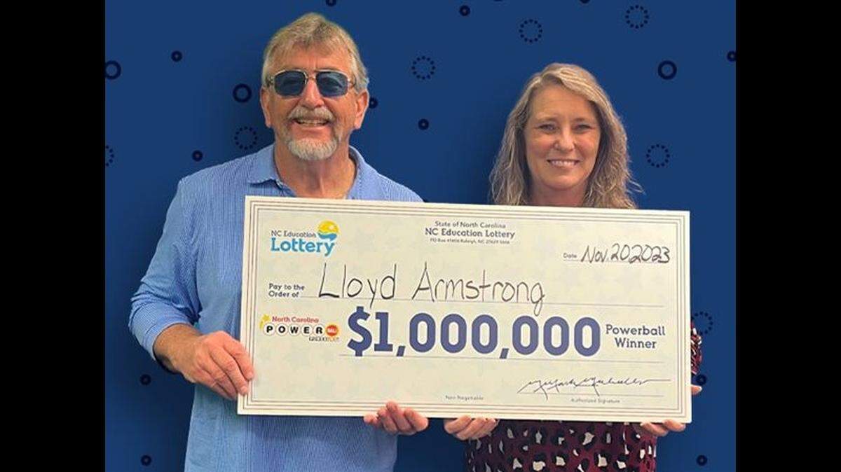 Lloyd Armstrong, pictured with his wife, Deanna, missed a larger jackpot prize by one number.