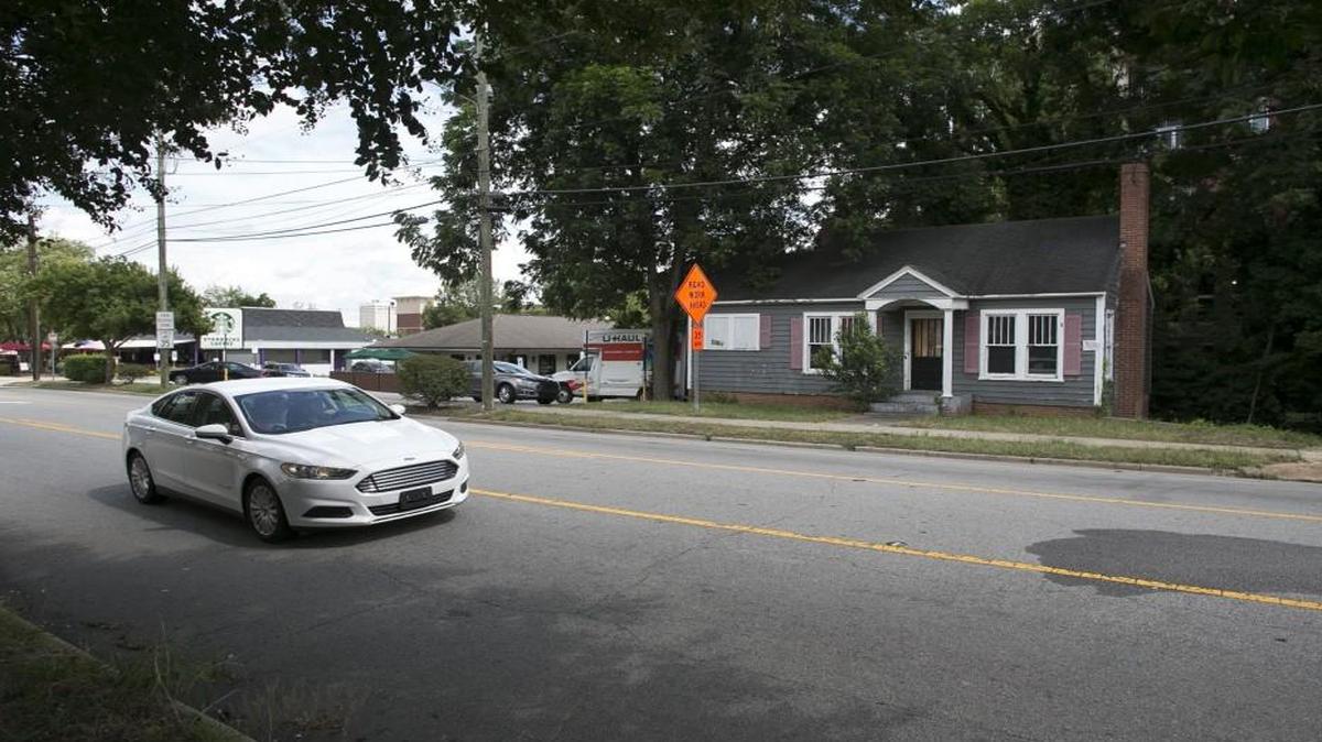 Developers plan to build a 60-room boutique hotel at this 615 Peace Street site.