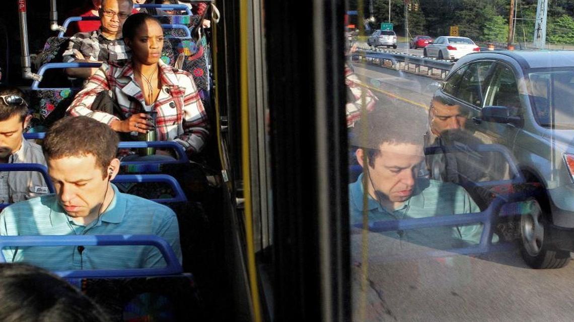 Riders make their morning commute on a transit bus in Raleigh. In Wake County, the percentage of commuters who drive to work alone is has fluctuated between 79 percent and 81 percent over the past decade.