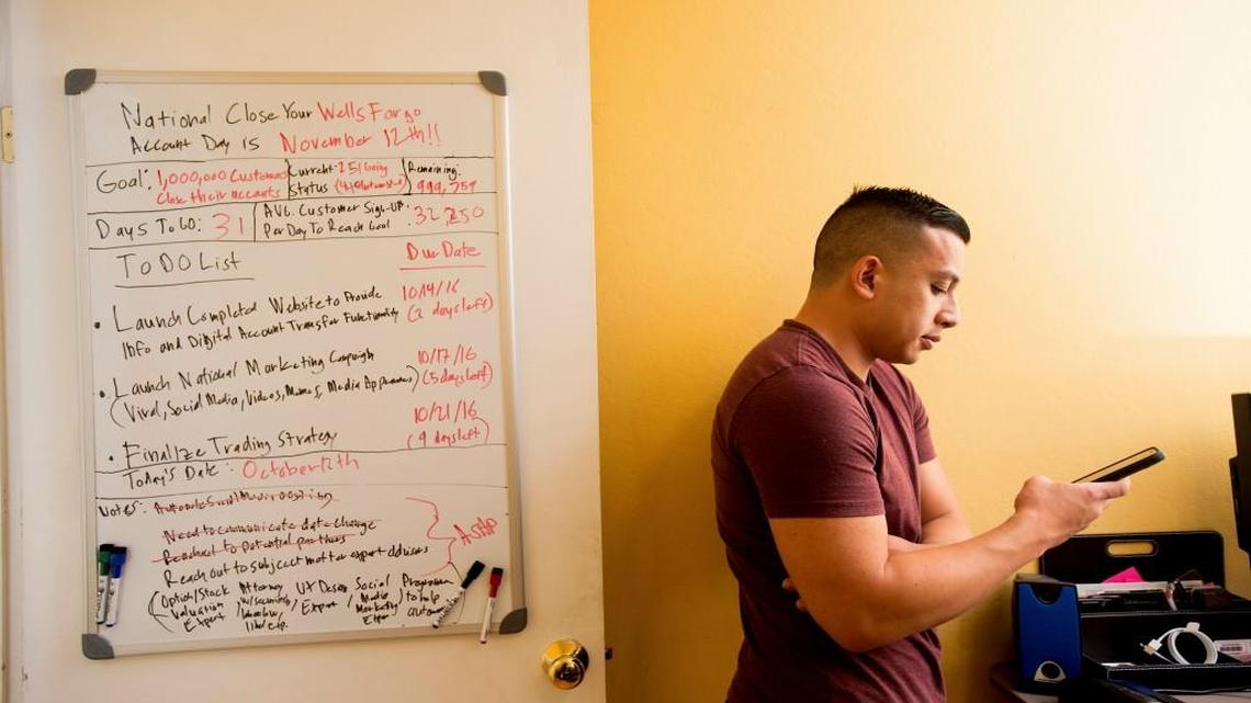 Kevin Pham, a former Wells Fargo employee now running a campaign urging customers to close their accounts, stands outside a branch in Daly City, Calif., Oct. 18, 2016. Wells Fargo would like to close the chapter on its sham account scandal, but lawmakers and regulators will not let it go that quickly, and emerging evidence that some victims were among the bank’s most vulnerable customers has given them fresh ammunition.