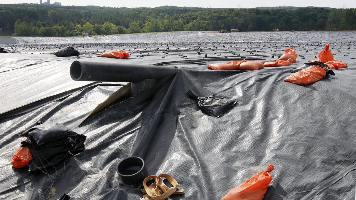 
A large-diameter leachate pipes rise up at the lip of the state-of-the-art lined coal ash landfill in Person County, NC. Chatham County has agreed to host a similar landfill for Duke Energy in exchange for $19 million, which the county will use for environmental monitoring and possibly for catastrophic insurance.
