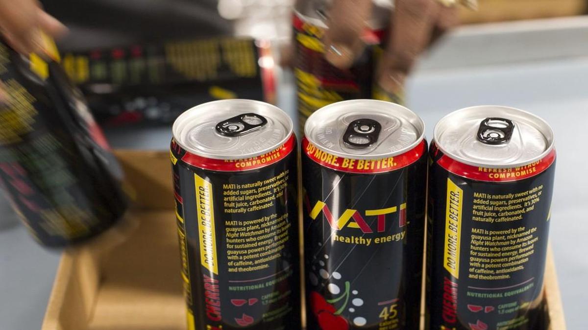 Cans of MATI energy drink roll off the production line and are packaged for shipping at the MATI production facility on Wednesday, September 7, 2016 in Clayton, N.C.