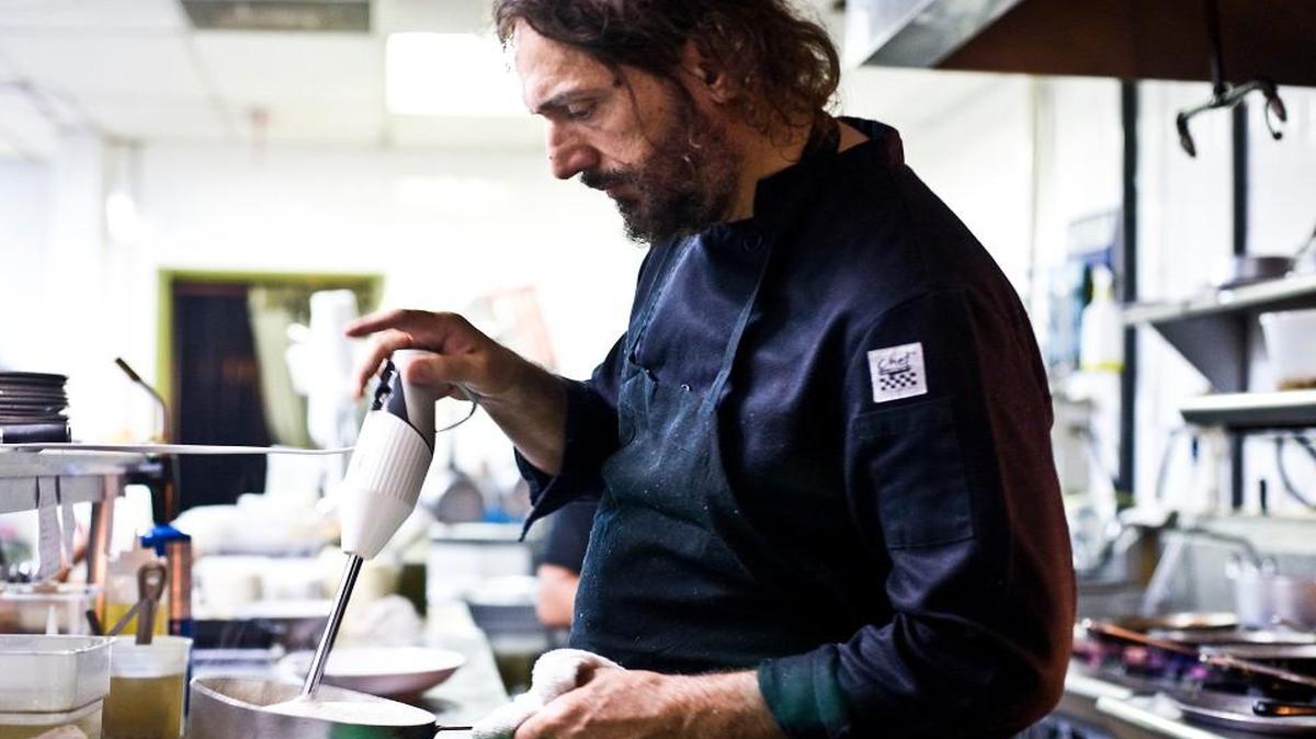 
Zod Arifai, chef at the Blu and Next Door restaurants, at work in the kitchen, in Montclair, N.J., Aug. 8, 2015. Arifai is letting the customers set the price at his two restaurants in Montclair, triggering a panoply of reactions. 
