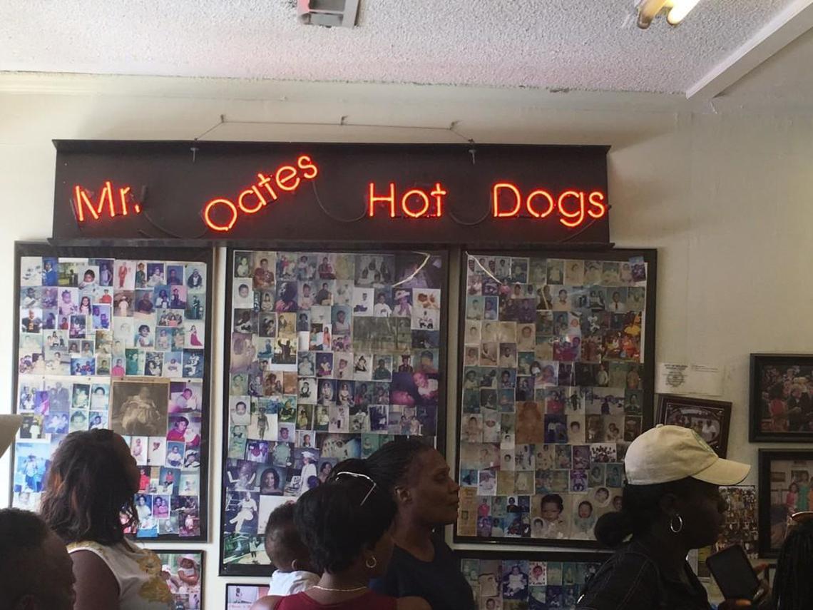 Customers waited in long lines Sunday, July 30, 2017, to get hot dogs and sausage dogs made by Charles Oates at Scooby’s in Southeast Raleigh.