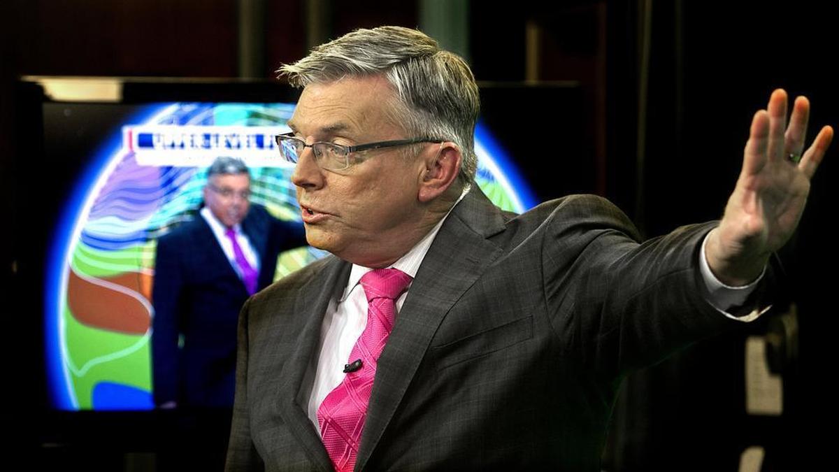 Meteorologist Greg Fishel works on-air during a late afternoon broadcast in the WRAL studio in Raleigh, N.C. File Photo