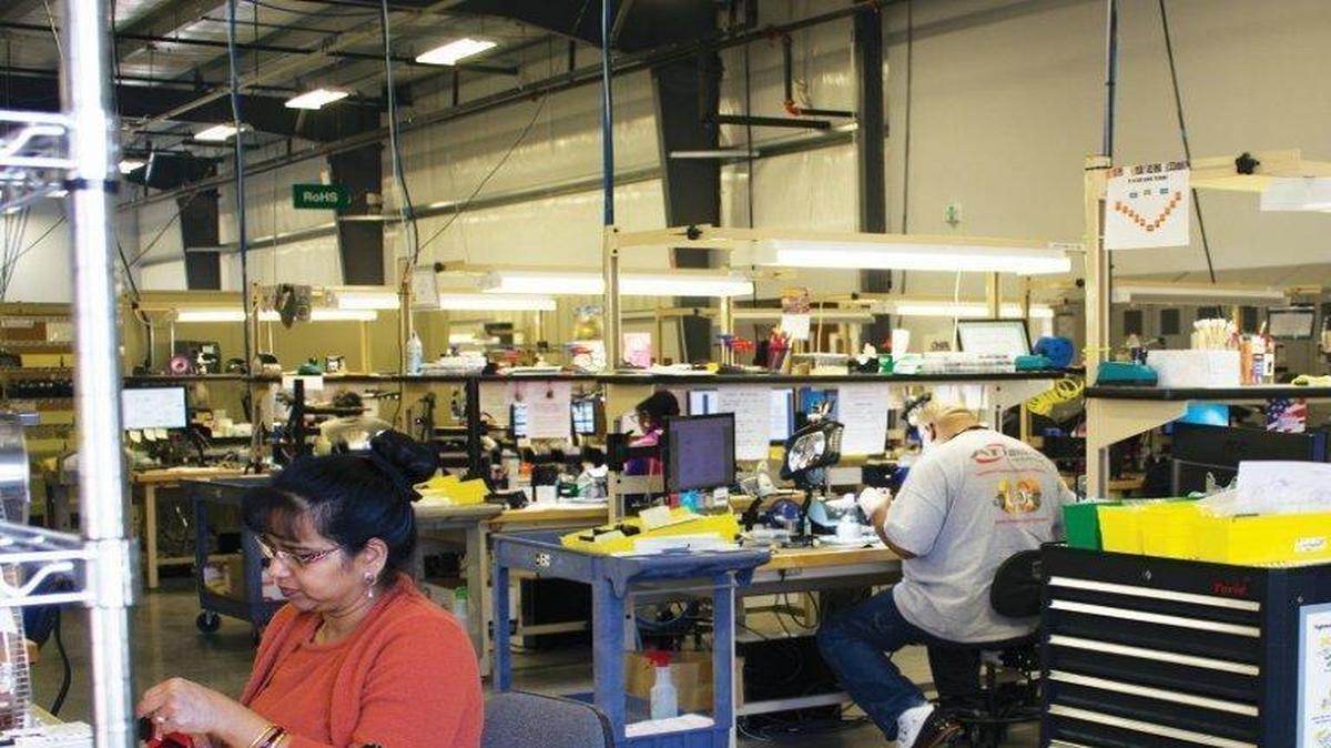 ATI Industrial Automation makes accessories for robots on its factory floor in Apex. The employee-owned company plans to hire 275 people over the next four years.