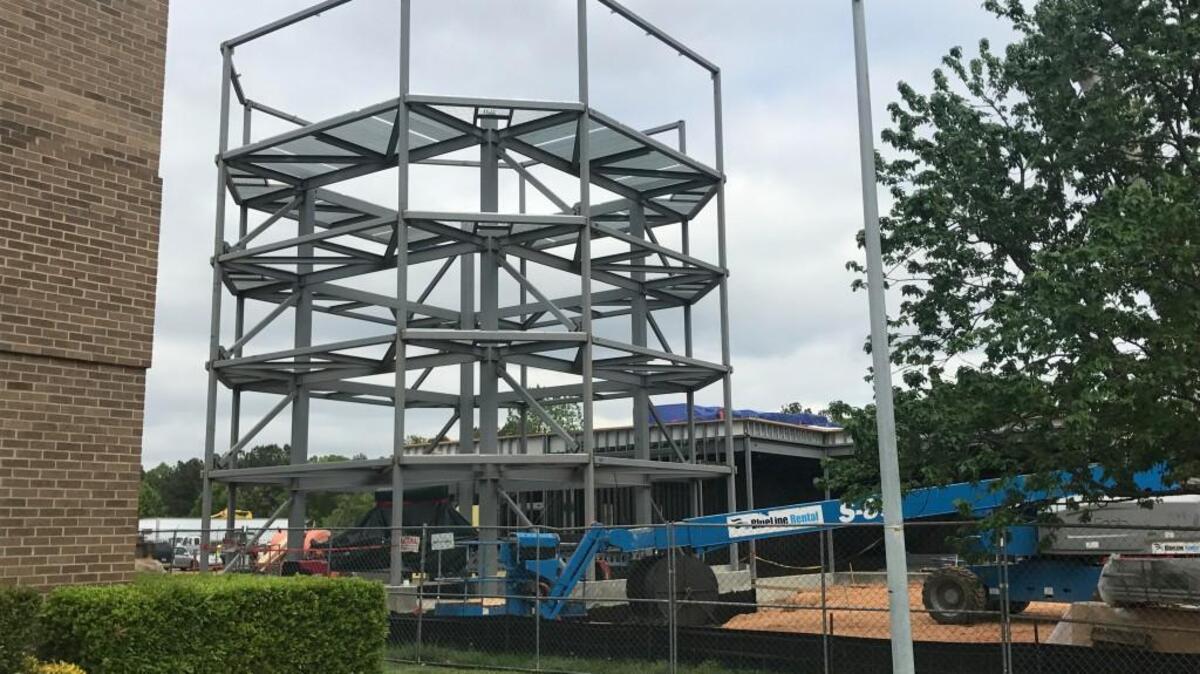 The framework for a Carvana car vending machine at 1631 Navaho Drive in Raleigh.