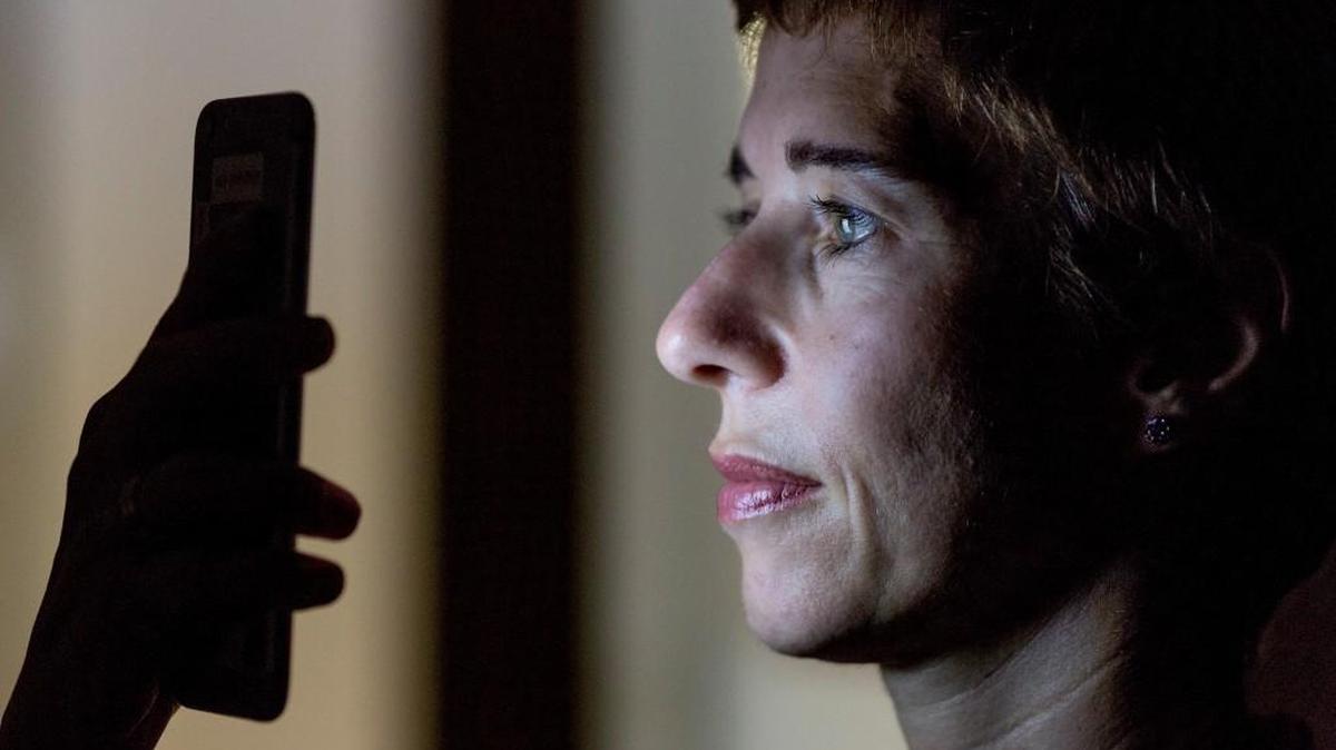 Secil Watson, the head of wholesale internet solutions at Wells Fargo, uses an eye scanner in the company’s app last week to gain access to her Wells Fargo account.