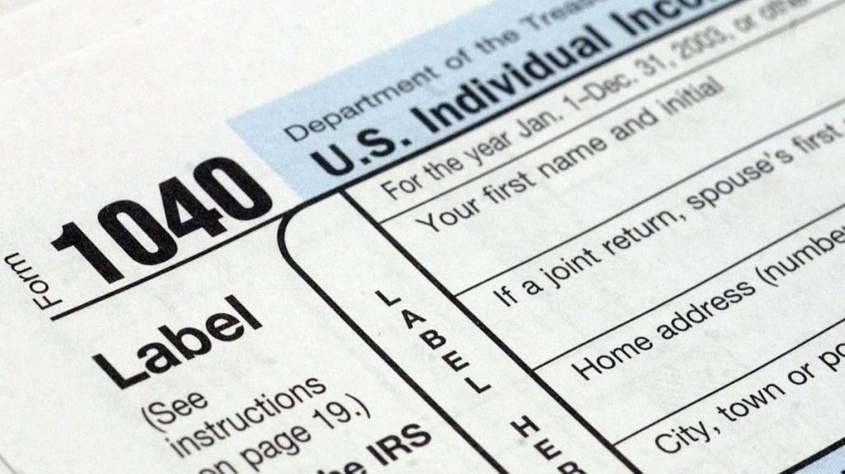 A file photo shows a federal tax form.