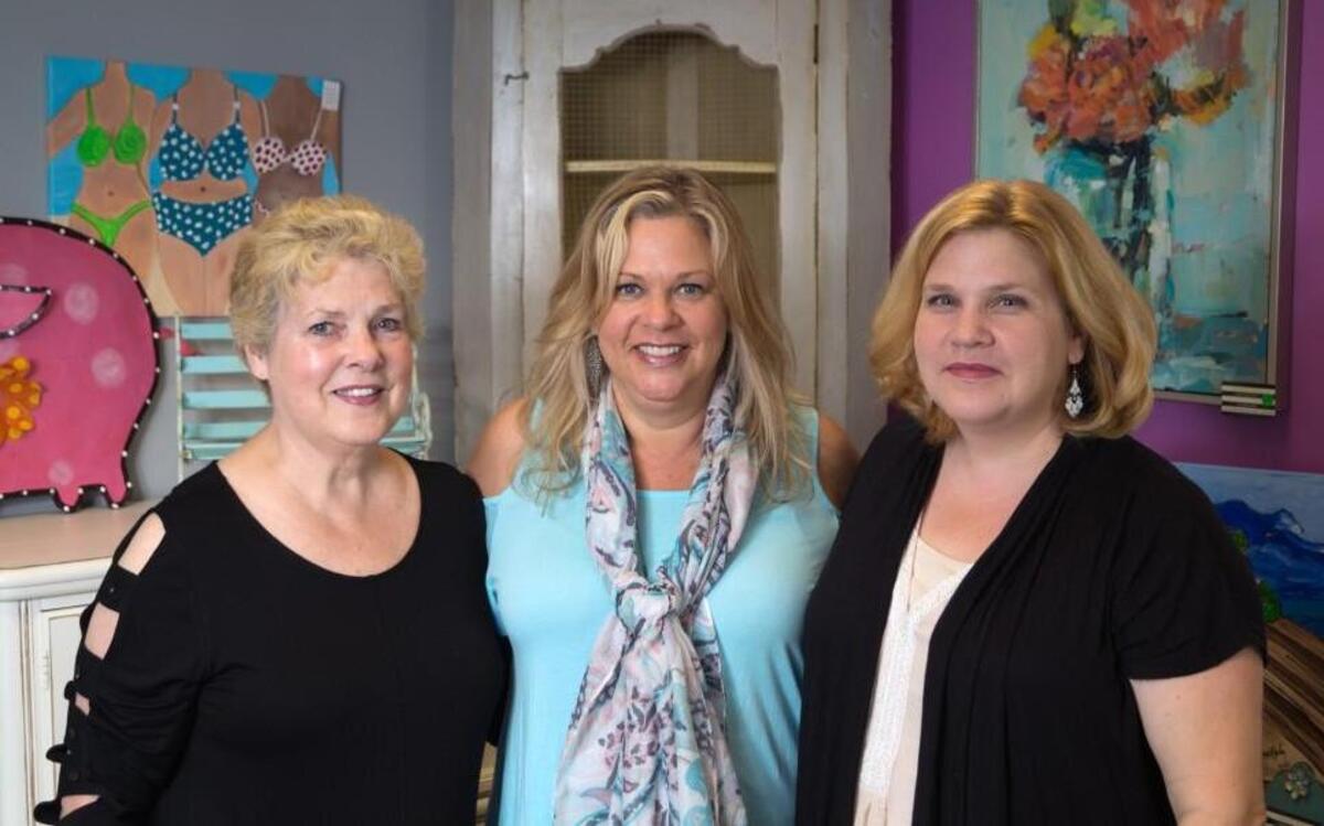 From left, Joyce Hawley, Liz Ennis and Chrissy Pressley are co-owners of Eclectic Furniture and Design.