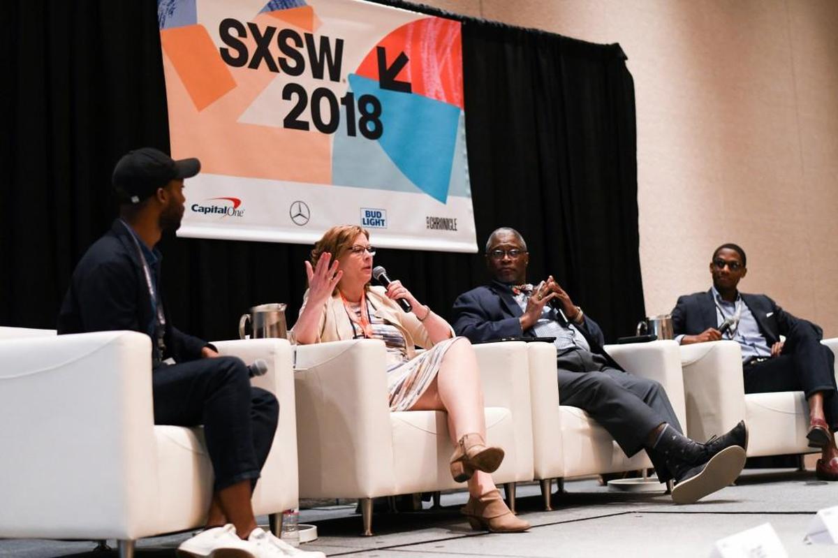 Raleigh Mayor Nancy McFarlane speaks during the “Primed for Amazon: Value & Cost of HQ2 for Cities” discussion at the South By Southwest festival in Austin, Tx. on March 10, 2018. Asad Syrkett sits to her left, Kansas City Mayor Sylvester James Jr. sits to her right and Justin Bibb of Gallup sits at her far right.