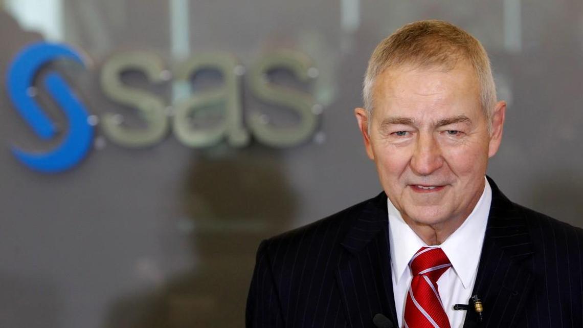 SAS CEO Jim Goodnight speaks to the media at a ceremony dedicating a new building on the SAS campus in Cary on Oct. 21, 2014.