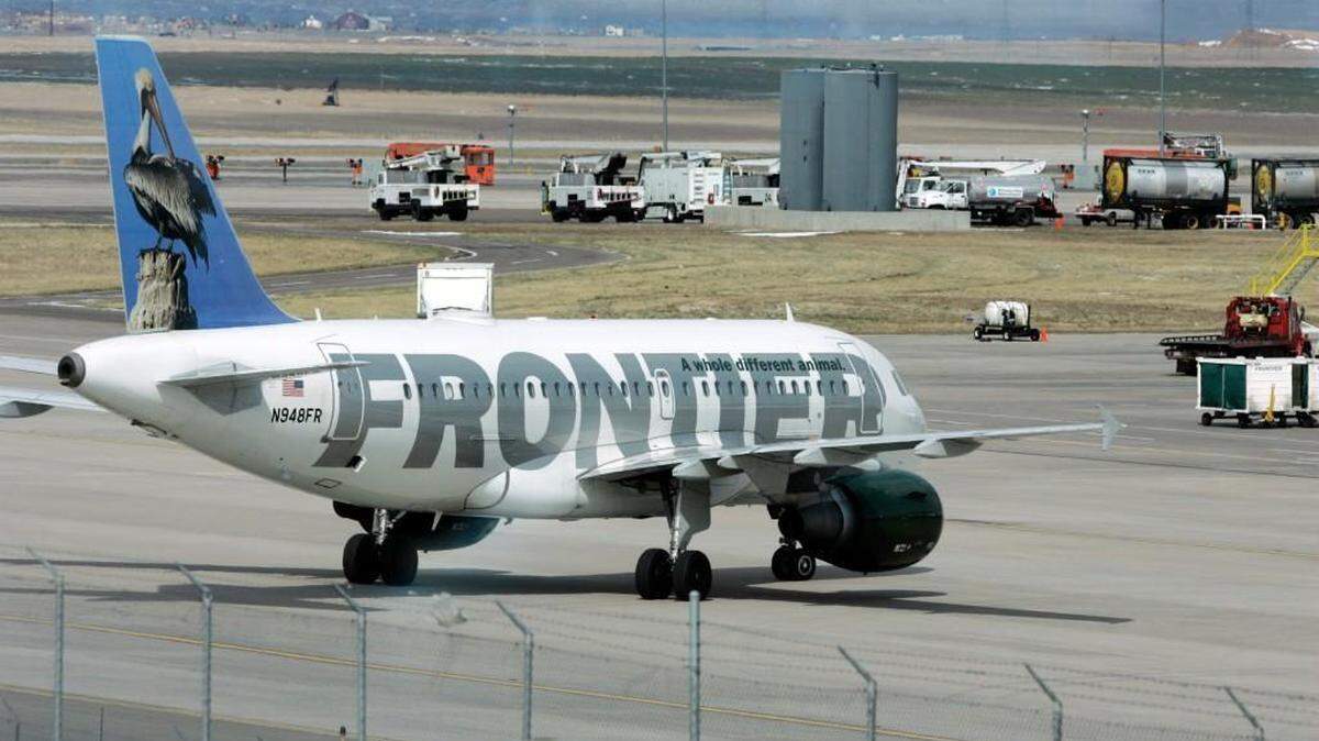 A Frontier Airlines jet taxis to its gate at Denver International Airport in this 2008 file photo. The airline has announced a new nonstop flight from Raleigh-Durham International Airport to Las Vegas.