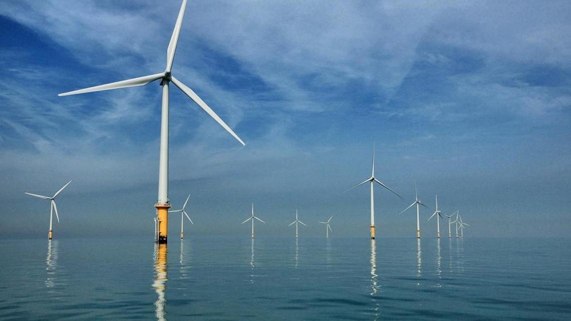 A team of researchers led by Duke University marine scientists will research how wildlife can be monitored and protected as offshore wind energy scales up. Here, turbines of the Burbo Bank off shore wind farm stand in a calm sea in the mouth of the River Mersey in Liverpool, England.