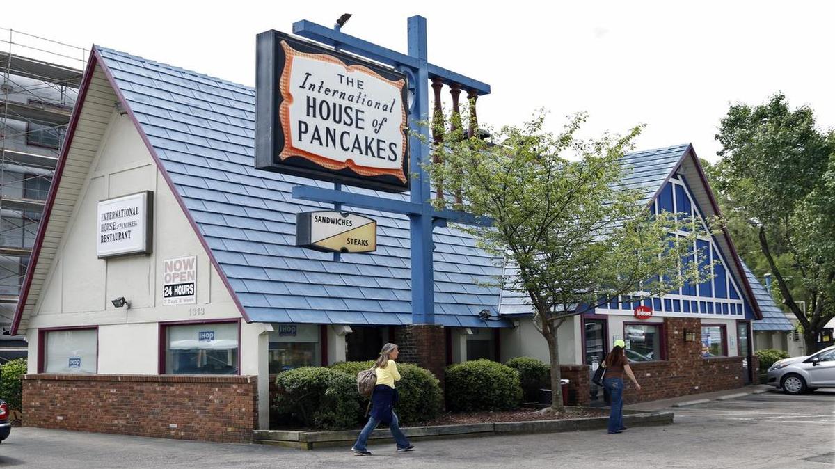 
Patrons enter the landmark International House of Pancakes restaurant at the corner of Hillsborough Street and Park Avenue near downtown Raleigh Thursday, May 14, 2015. The IHOP which has been in its present location since 1968 will move to its new Hillsborough Street/Dixie Trail storefront location in the Stanhope Student Apartments building just west of N.C. State campus in spring 2016.
