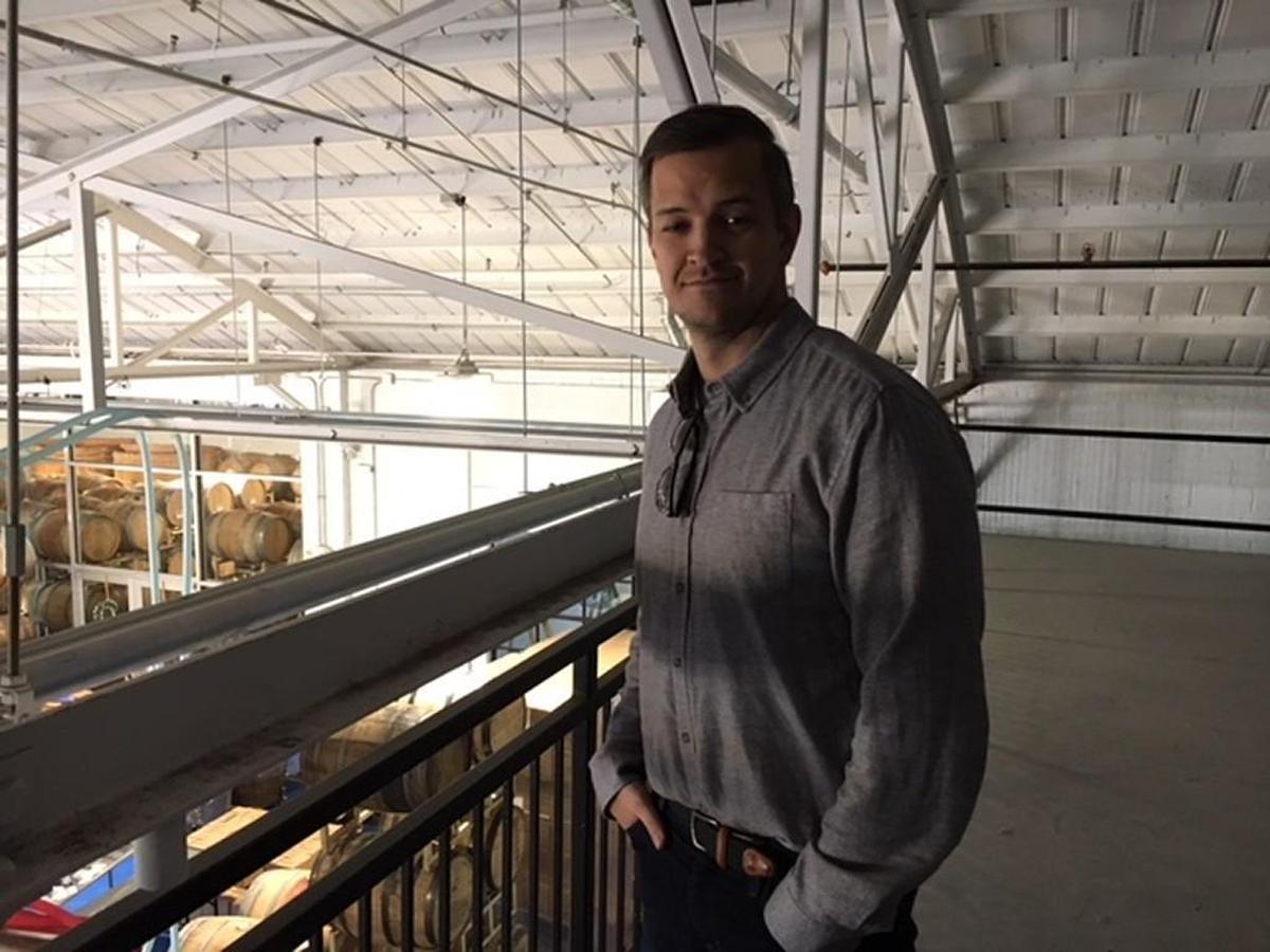 Developer James A. Goodnight in the mezzanine of a project that could bring a taproom to this warehouse in Southeast Raleigh where beer is made for Brewery Bhavana restaurant.