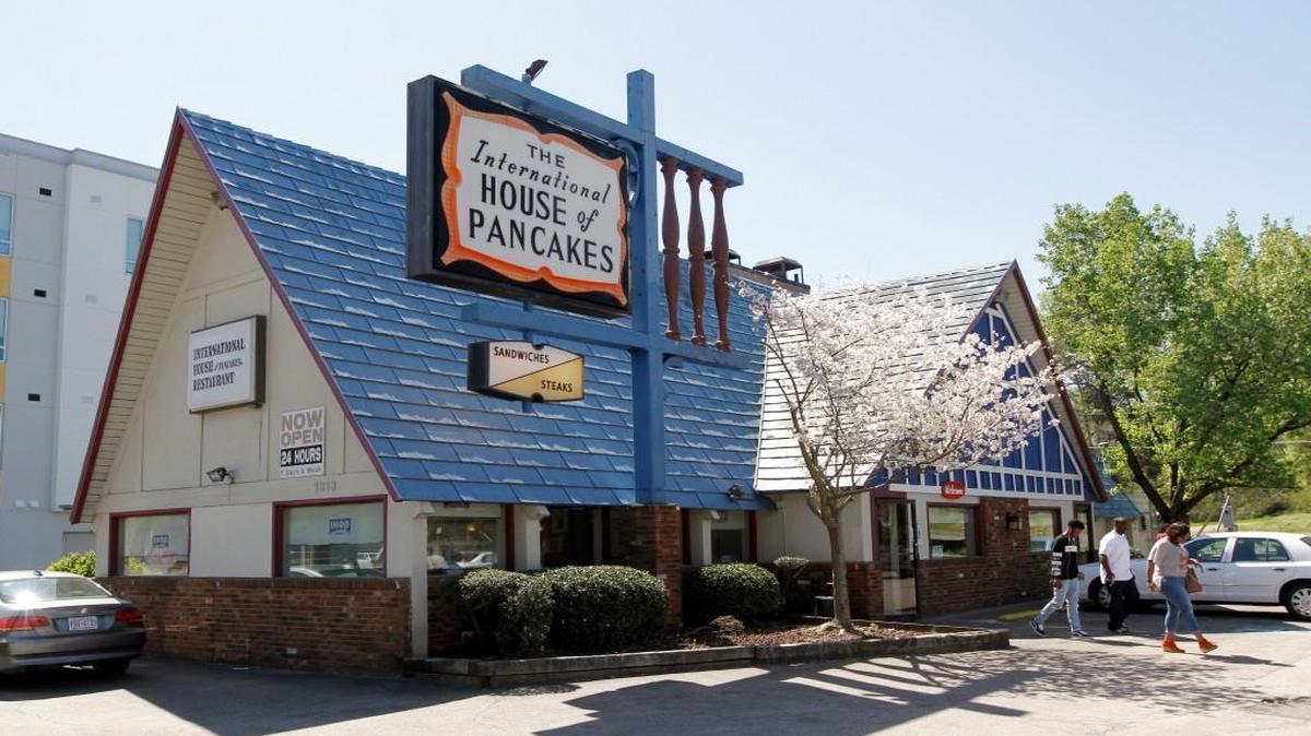 An old sign reflects the original name - The International House of Pancakes - at the IHOP on Hillsborough Street in Raleigh on March 30, 2016. The IHOP is moving from its iconic building, which it has occupied for decades, to a new, modern restaurant down the street in the Stanhope building. It's an end of an era for the slanted roof restaurant. The last slanted roof building was built in 1979.