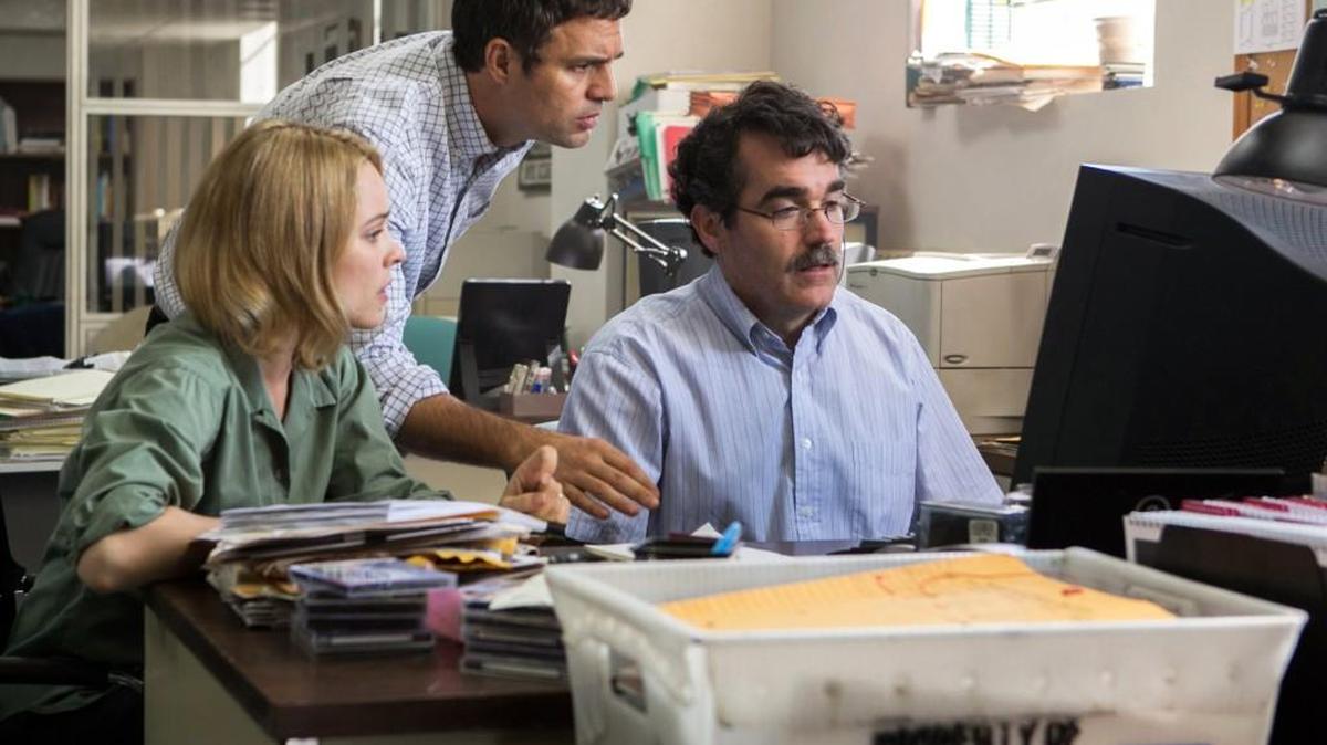 This photo provided by courtesy of Open Road Films shows, Rachel McAdams, from left, as Sacha Pfeiffer, Mark Ruffalo as Michael Rezendes and Brian dArcy James as Matt Carroll, in a scene from the film, "Spotlight." (Kerry Hayes/Open Road Films via AP)