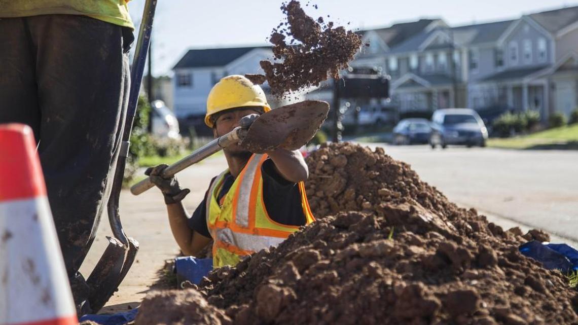 Contractors lay fiber optic lines for high speed internet in Cary, N.C. in 2015.