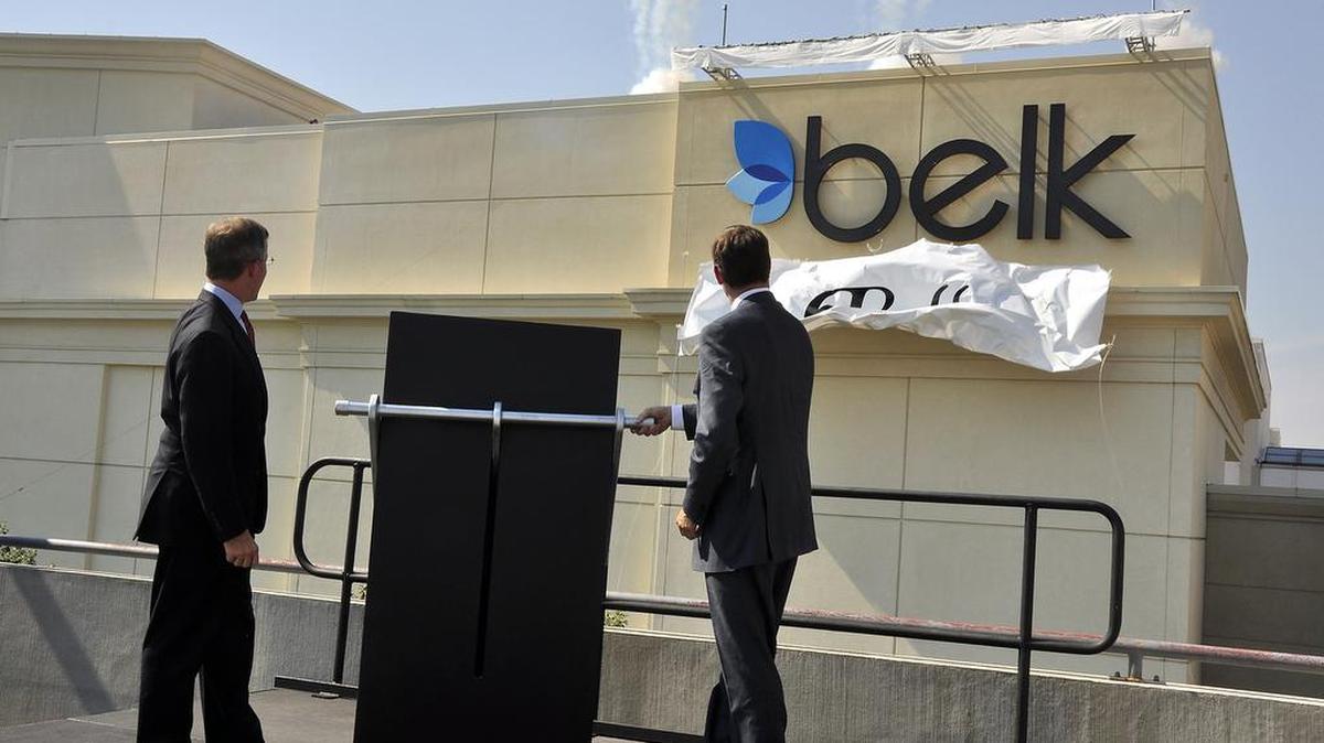 
Tim and Johnny Belk unveil the new Belk logo and store signage at Belk SouthPark Mall in 2010. The new logo and signage were part of a $70 million rebranding campaign. 

