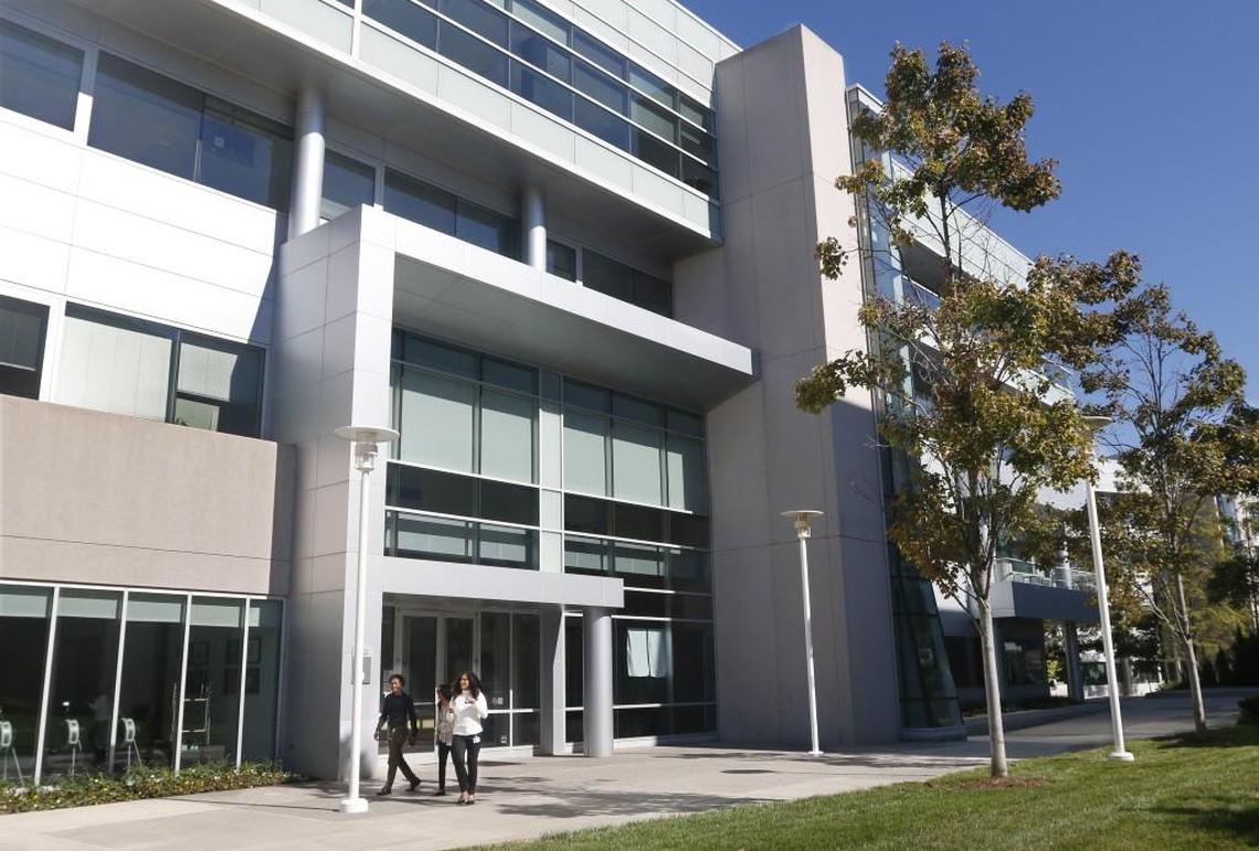Cisco staff leave Building #9 on the Cisco campus off of Kit Creek Road in Morrisville. N&O File photo.