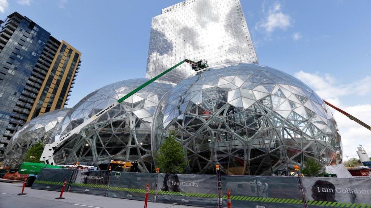 Three large, glass-covered domes became part of Amazon’s expansion of its campus in downtown Seattle in April. The company said Sept. 7 that it will spend more than $5 billion to build another headquarters in North America to house as many as 50,000 employees.