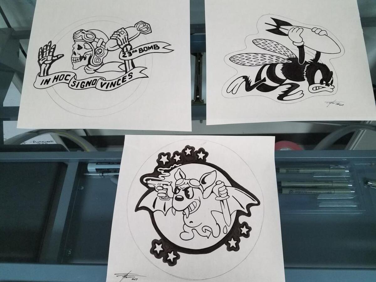 Ranger Up art designs that appear on T-shirts and other products.