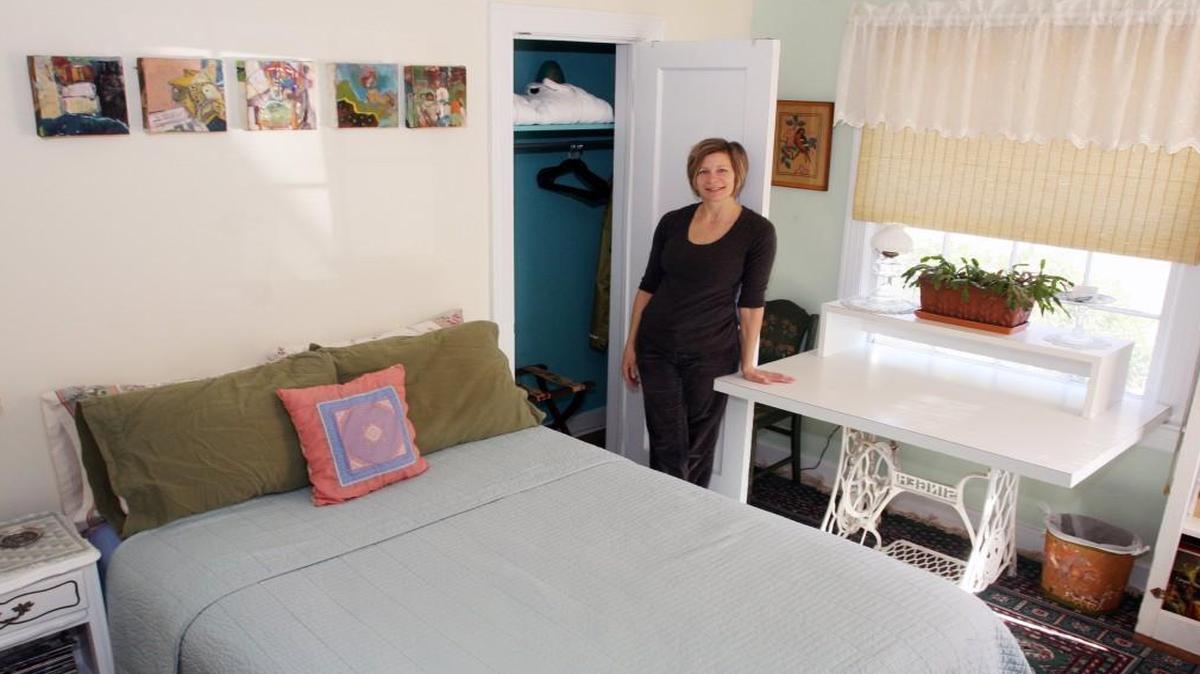 Allyn Meredith stands in the room she rents out in Durham on the Airbnb online platform. Raleigh has been trying to enact rules for short-term rentals since 2015.