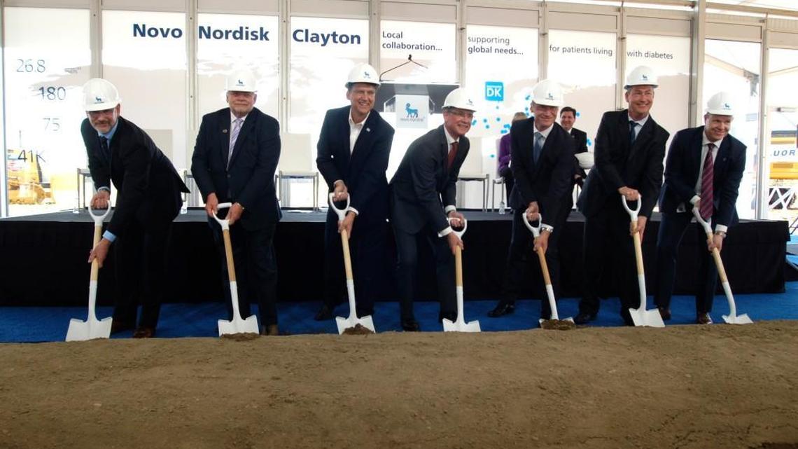 Novo Nordisk and North Carolina elected officials dug into the Johnston County soil to mark the start of construction on a new $1.8 billion insulin manufacturing plant in Clayton.